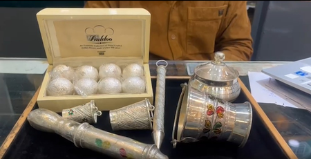 Lucknow’s bullion market shines with gold-silver plated pichkaris, buckets for Holi