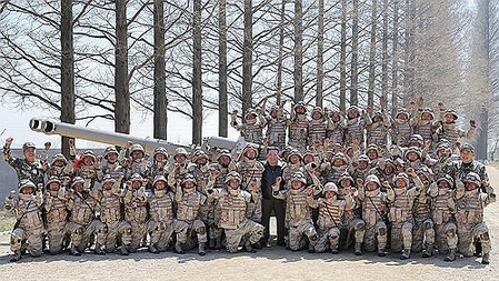 North Korea’s Kim oversees artillery firing contest on state founder’s birthday