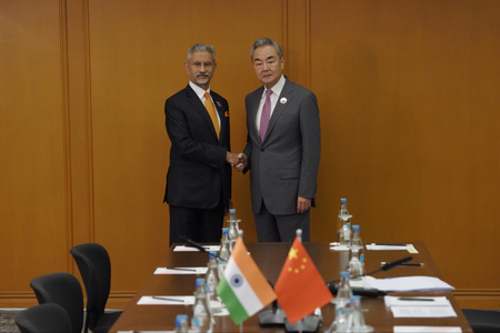 EAM Jaishankar holds talks with Chinese FM Wang Yi in Manila, says ties gradually normalising