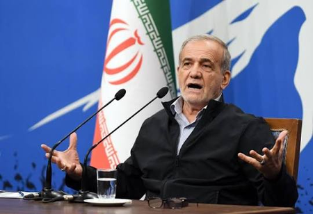 Iran’s president says Tehran favors dialogue, but won’t be forced to surrender