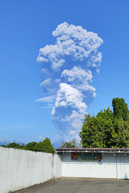 Indonesia extends closure of four airports as volcano erupts again
