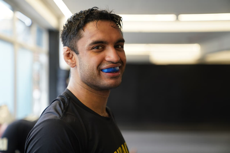 Why did Varun Sanyal pull out of MMA QF at Asian Games?