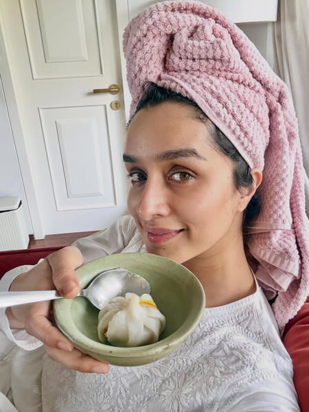 Shraddha Kapoor gorges on modak as she shares glimpses from Ganpati celebrations