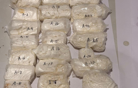 Cocaine tucked into trolley bag handle, plastic supports; Ugandan flyer held at Ahmedabad airport
