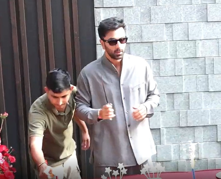 Ranbir Kapoor celebrates his 44th birthday with paparazzi outside his house