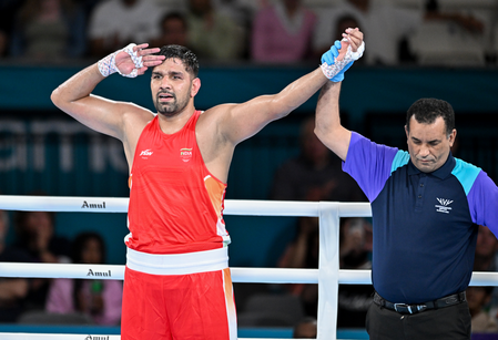 Asian Games: Narender confirms medal after stunning QF win, Sachin bows out