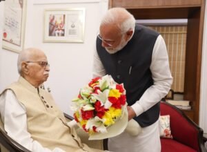 On the day marking his 25 years at the helm, PM Modi calls on L.K. Advani
